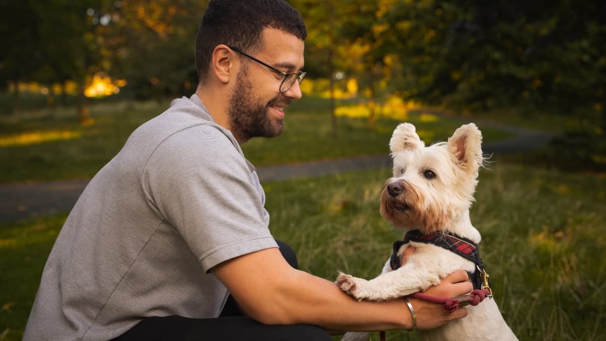 man-with-westie-in-park